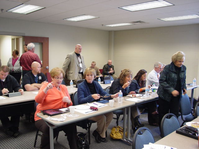 Photo of faculty person asking question in traiing class