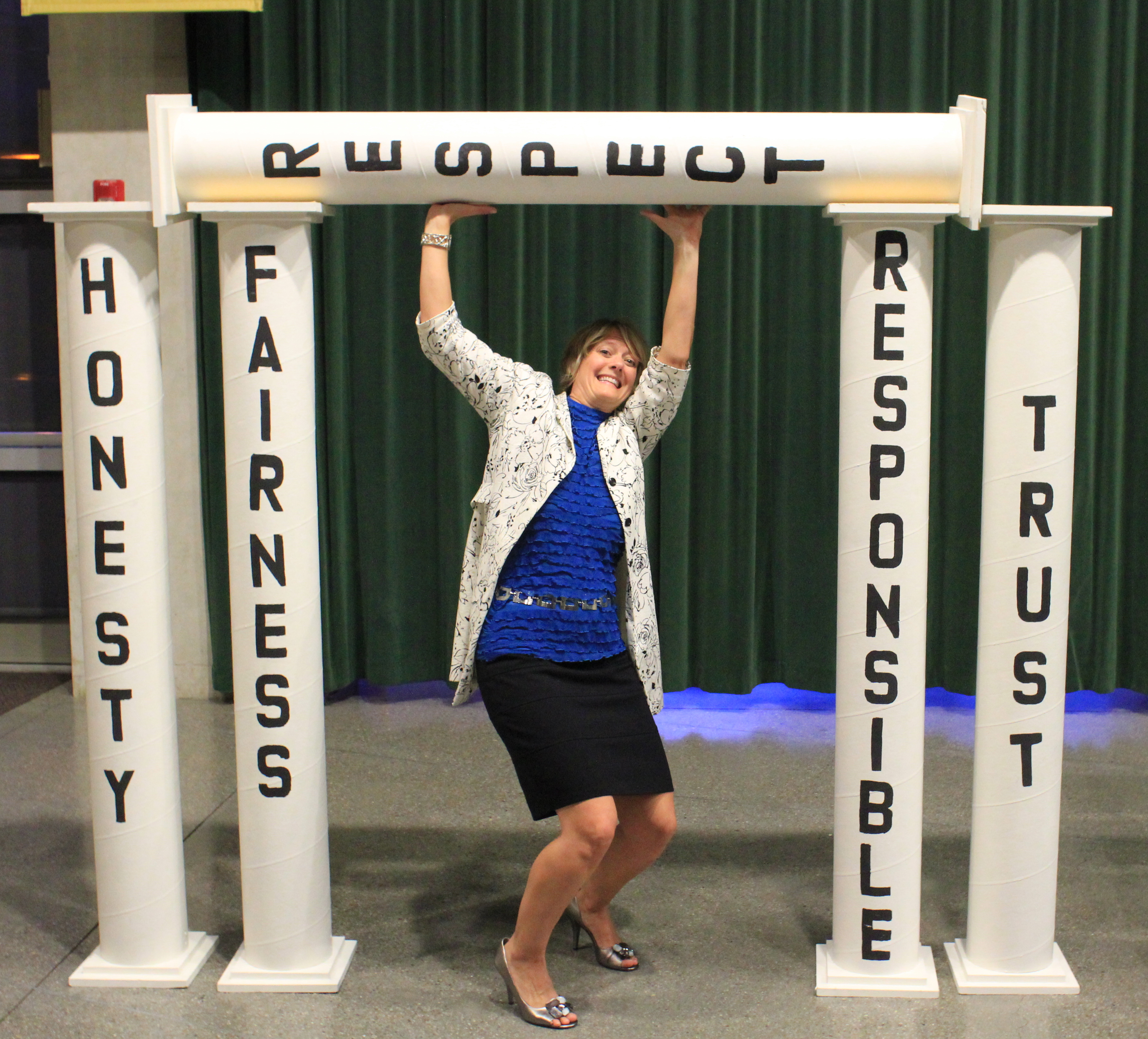 Picture of Tricia Bertram Gallant among the five pillars of academic integrity: honesty, fairness, respect, responsible, and trust.