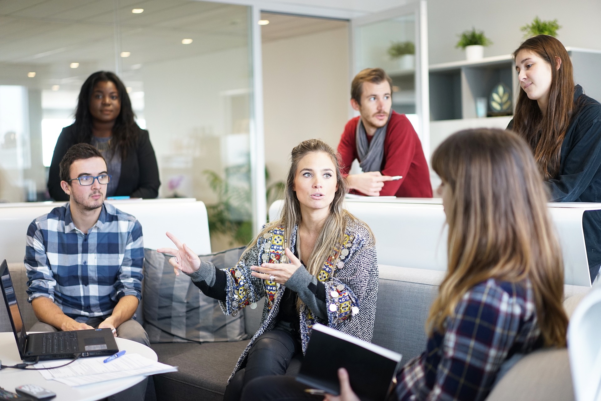 Several people in an office talking