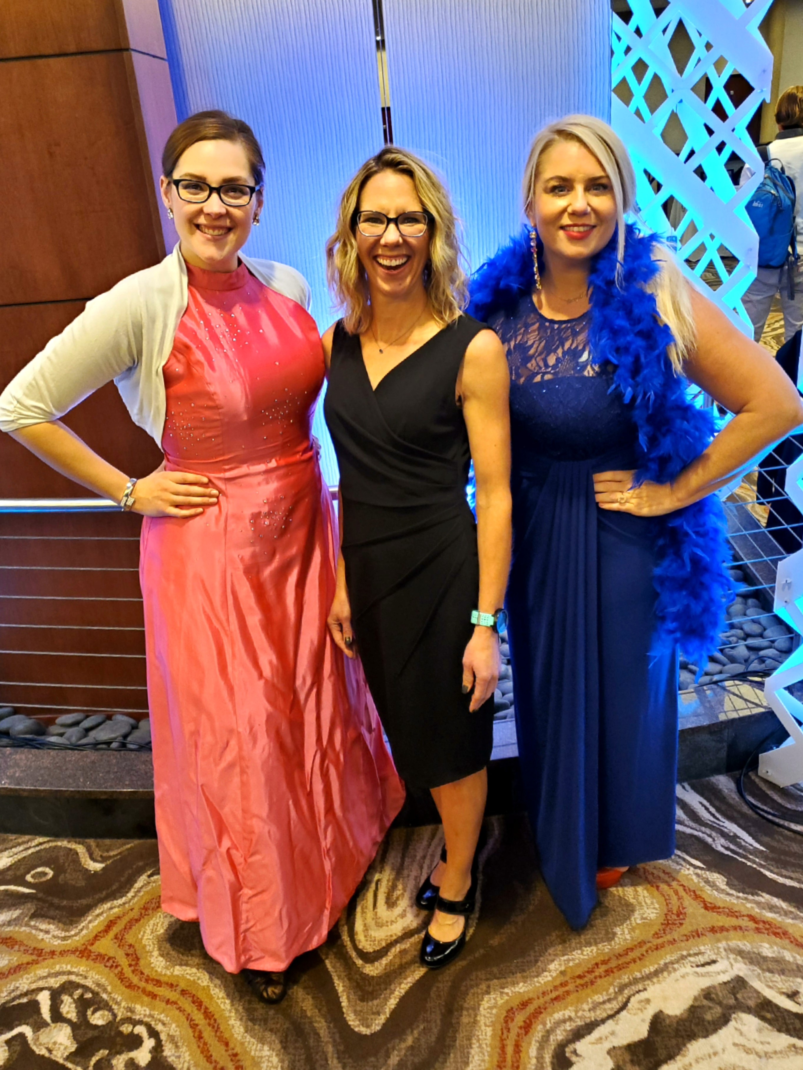 Lindsey, Megan, and Tanya dressed up in long formal dresses for the awards show