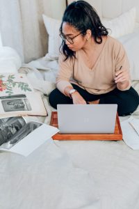 a woman working on a laptop