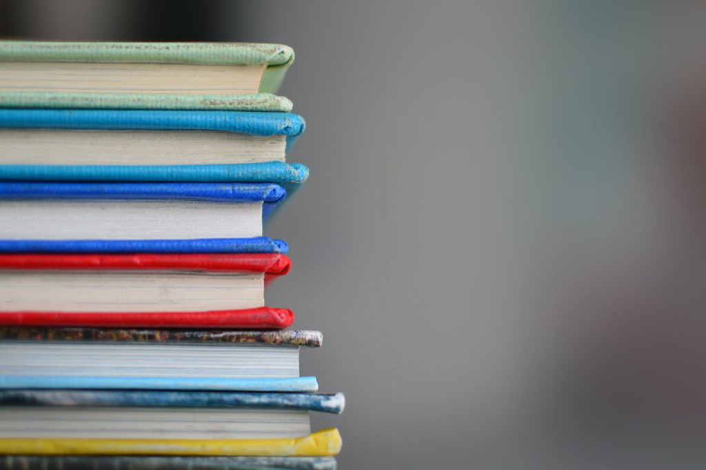 Pile of multicolored books.