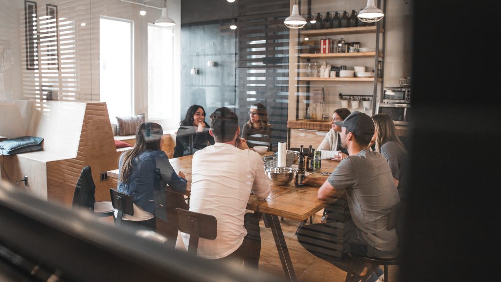 A group of people in a work meeting