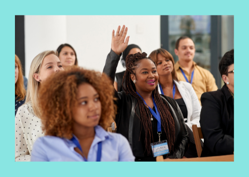 Group of people watching a presentation