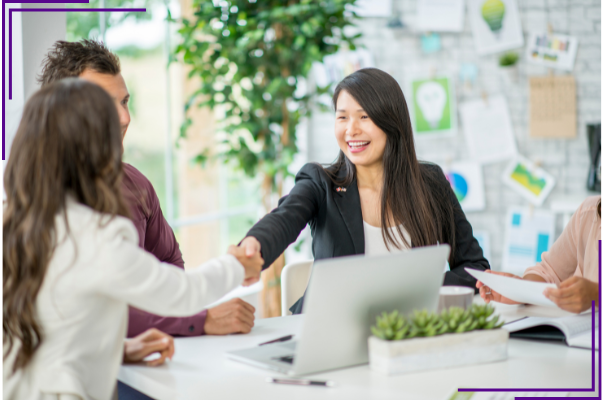 Group of professionals shaking hands