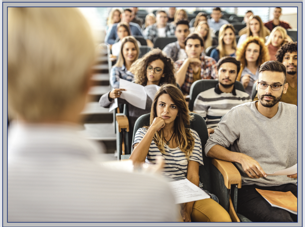 group of students listening to a speaker